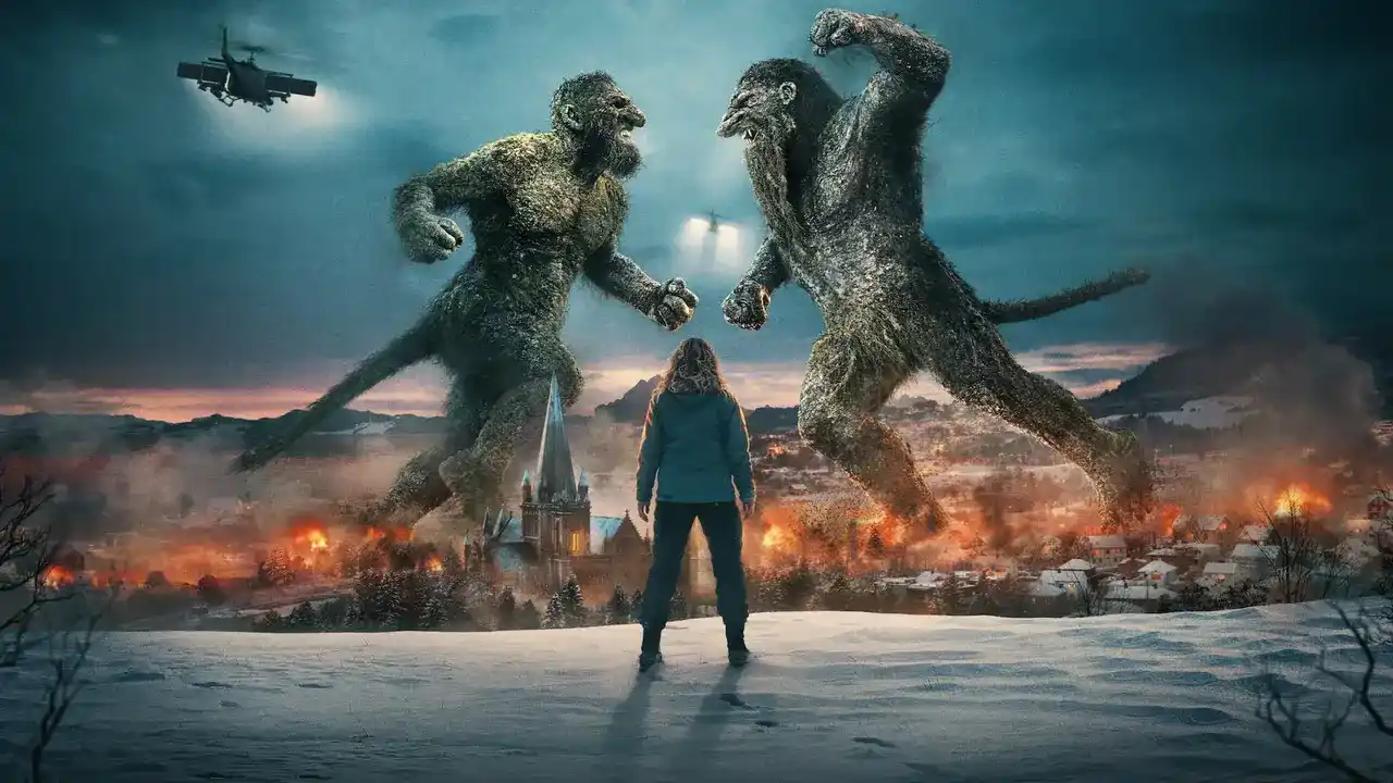 Poster oficial de Troll 2 en el que se parecia a dos criaturas peleando con una ciudad devastada a sus pies